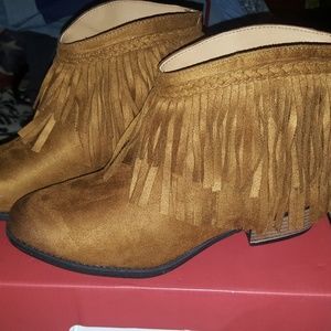 Brown fringe booties. Small heal. Brand new in box